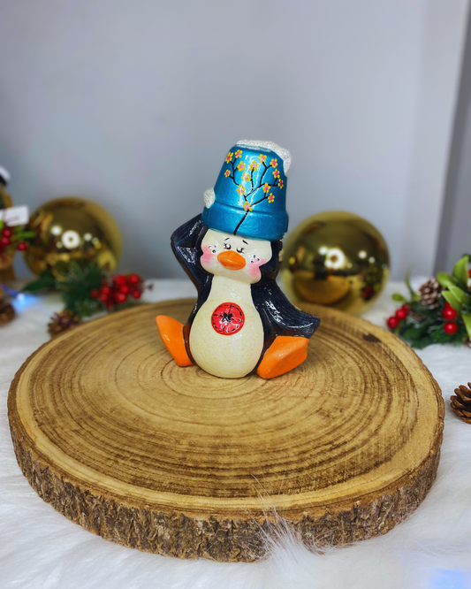 Pinguino con maceta