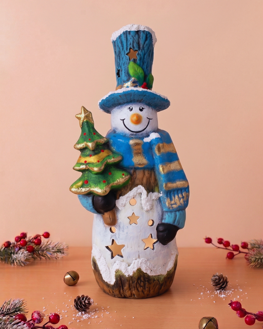 Hombre de Nieve con árbol